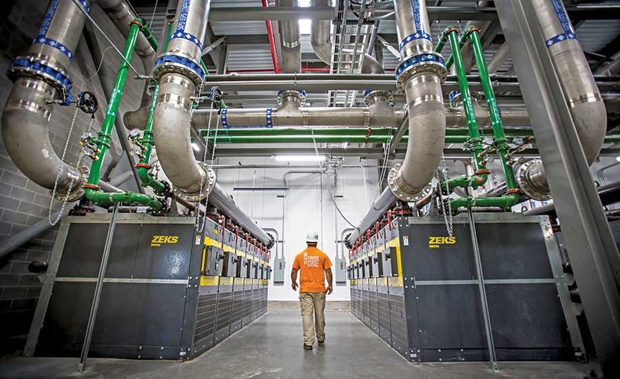 A photo of man on the construction site, who is going to conduct an automated construction inspection.