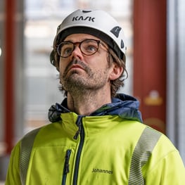 Photo of Johannes Ris, Project Manager at Byggstyrning at the construction jobsite. Johannes Ris is a vivid user of the Imerso platform in Sweden